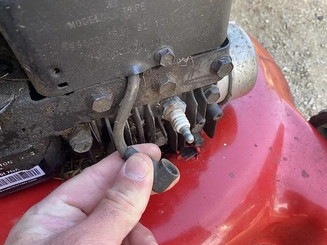 mower spark plug safety